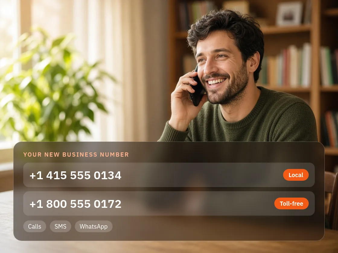 Business owner talking on a phone using a new CallHippo business number